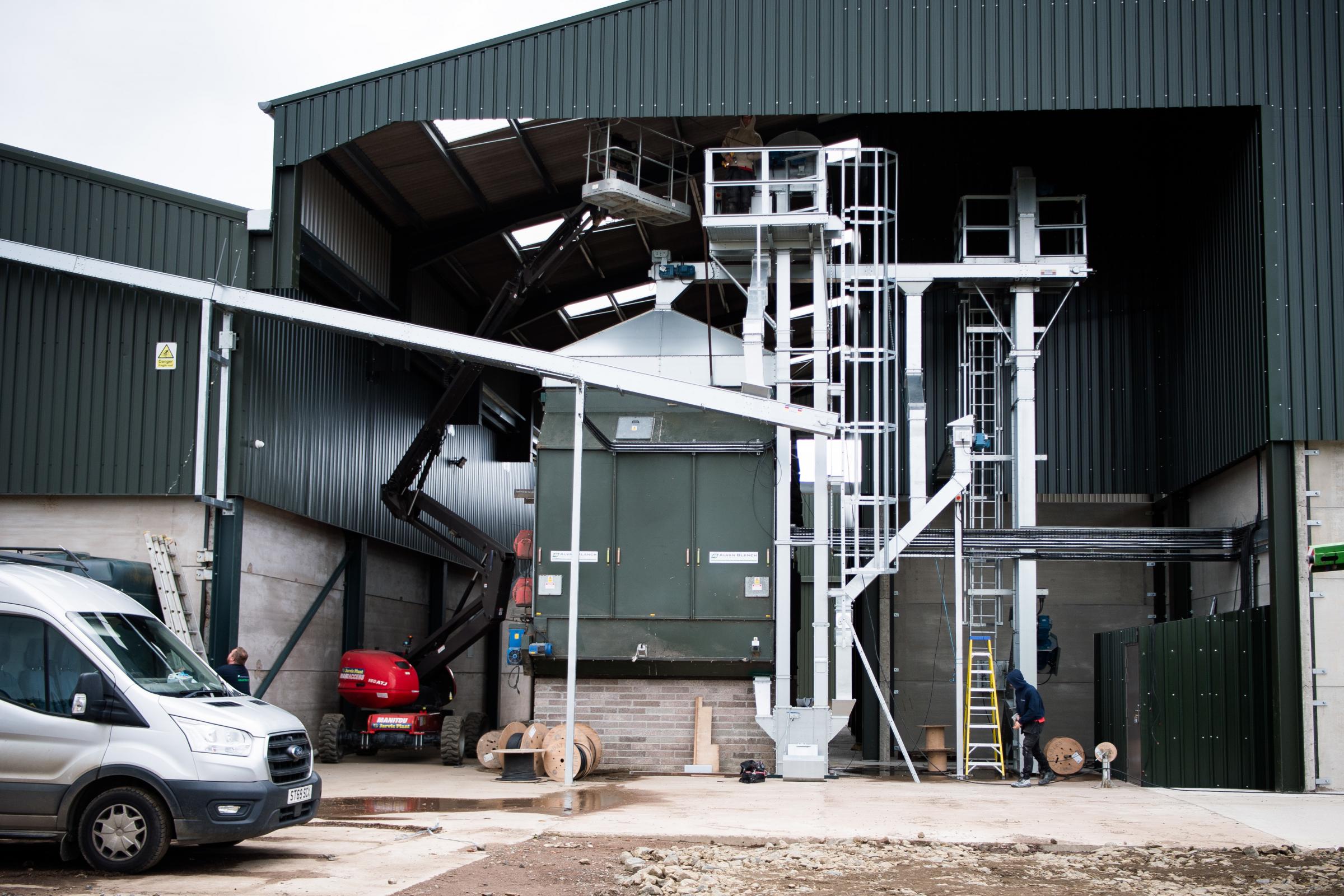 Final steps in the install of this Alvan Blanch grain dryer Ref: RH040724235 Rob Haining / The Scottish Farmer...